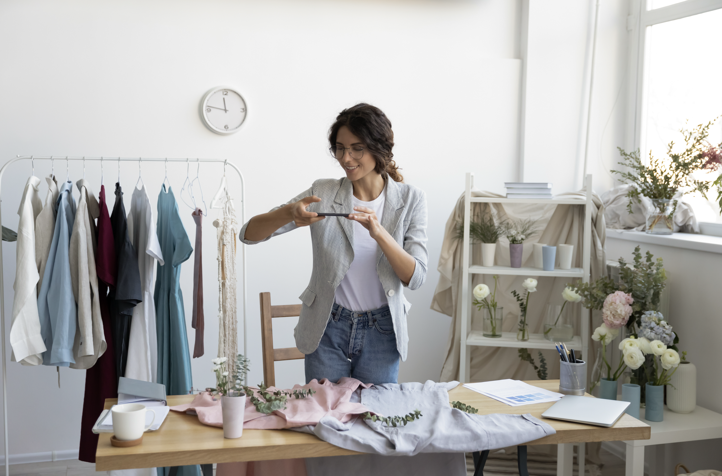 Fashion design workspace with mood boards